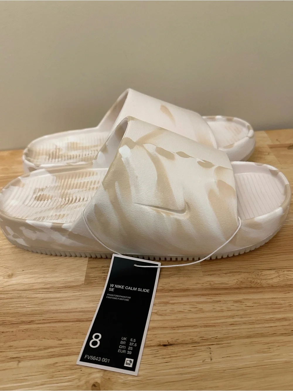 Nike Calm Slide SE in Cream and Tan Marbled Print